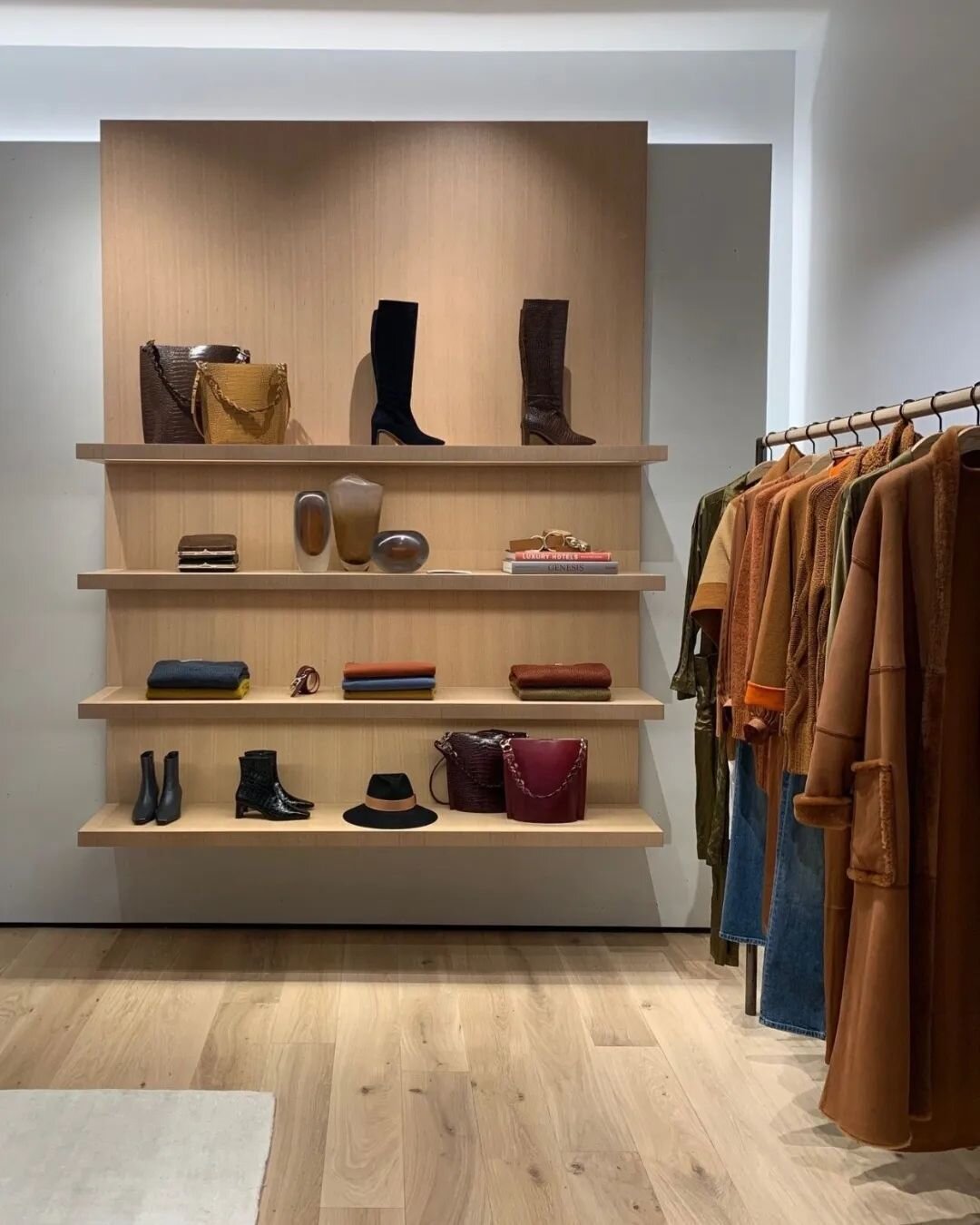 Finishes and lighting highlight this gorgeous millwork at the @lafayette148ny Americana Manhasset boutique. #retaildesign #retailexperience #millwork #brickandmortar #projectmanagement