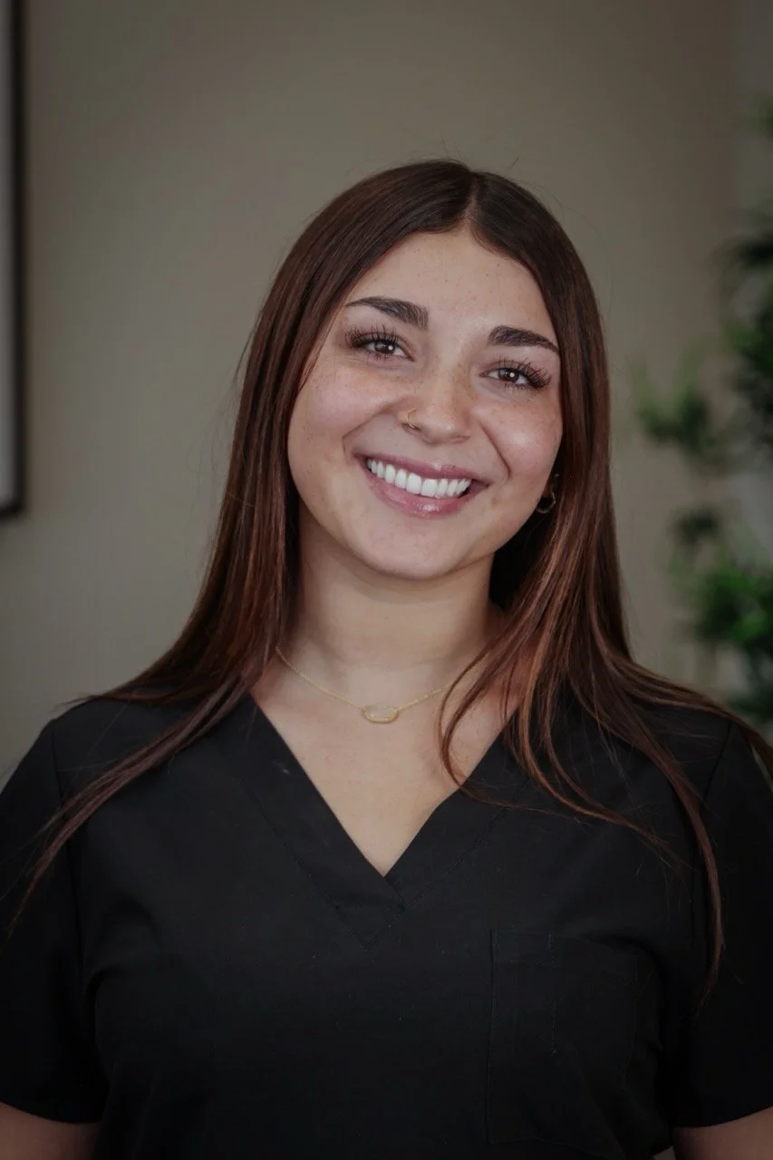 happy molar dental team member Arianna smiling