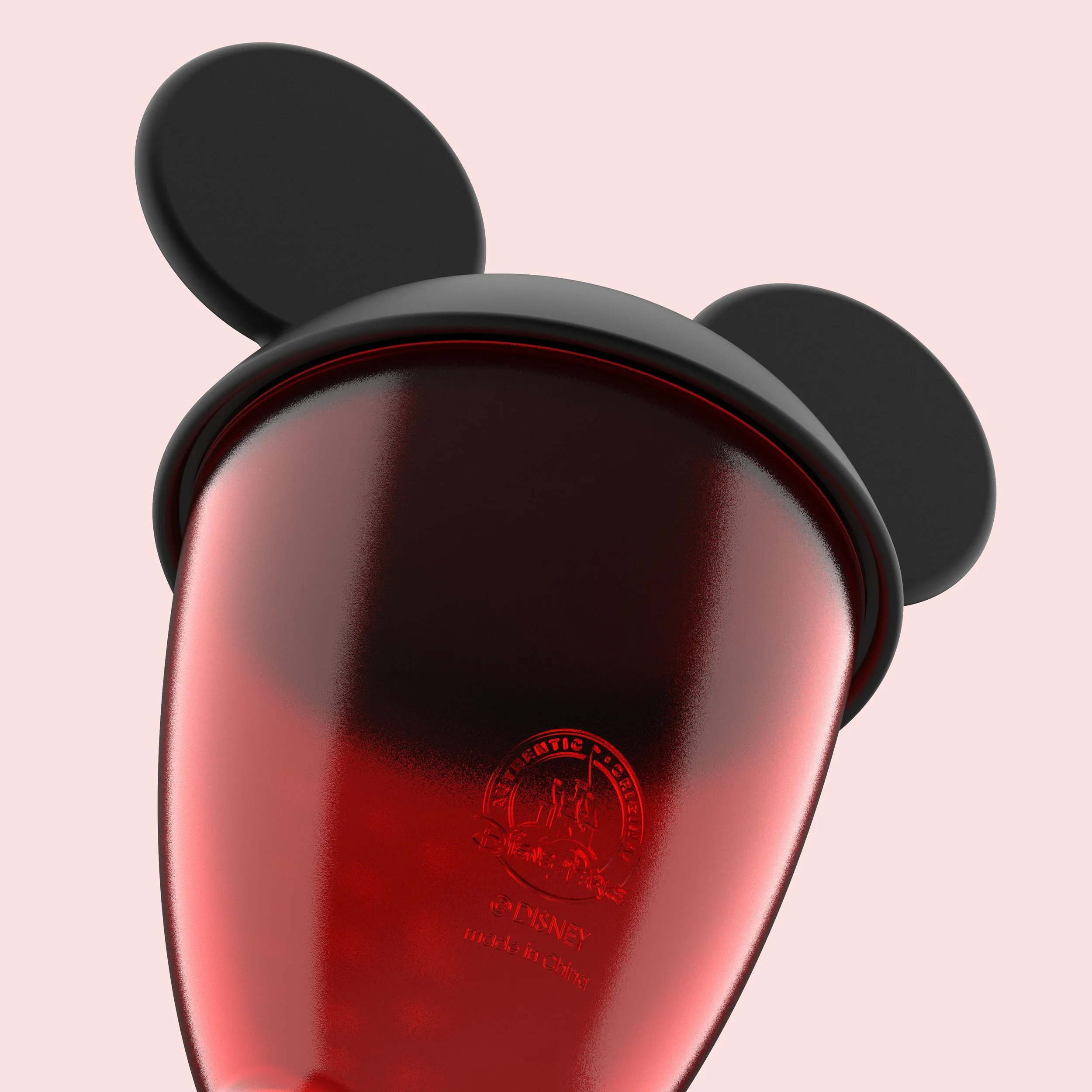 Disney Mickey measuring cup with red silicone lid and debossed logo product design by DesignOther New York