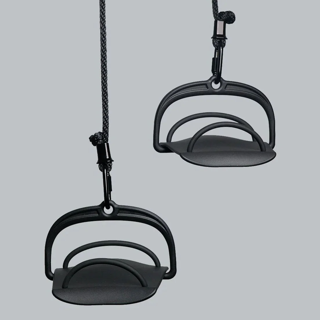 Basis Surf Paddle Trainer ergonomic paddle handle detail view with rope and carabiner attachment surf training equipment