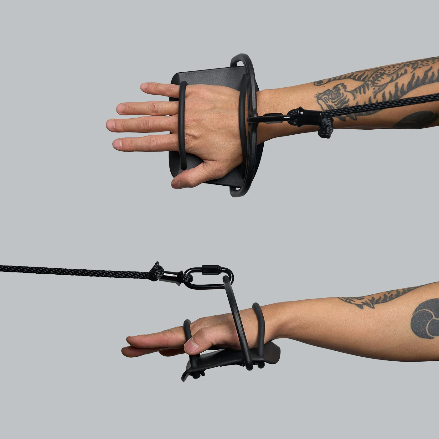 Basis Surf Paddle Trainer ergonomic paddle handles shown on hands demonstrating catch and recovery paddle stroke position