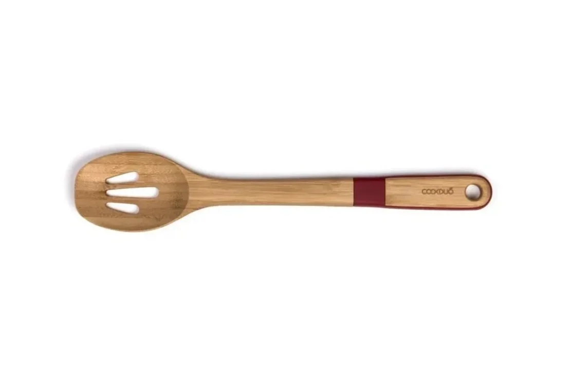 Single Cookduo Bamboo Grip slotted serving spoon in natural bamboo with red wraparound silicone handle grip for everyday cooking