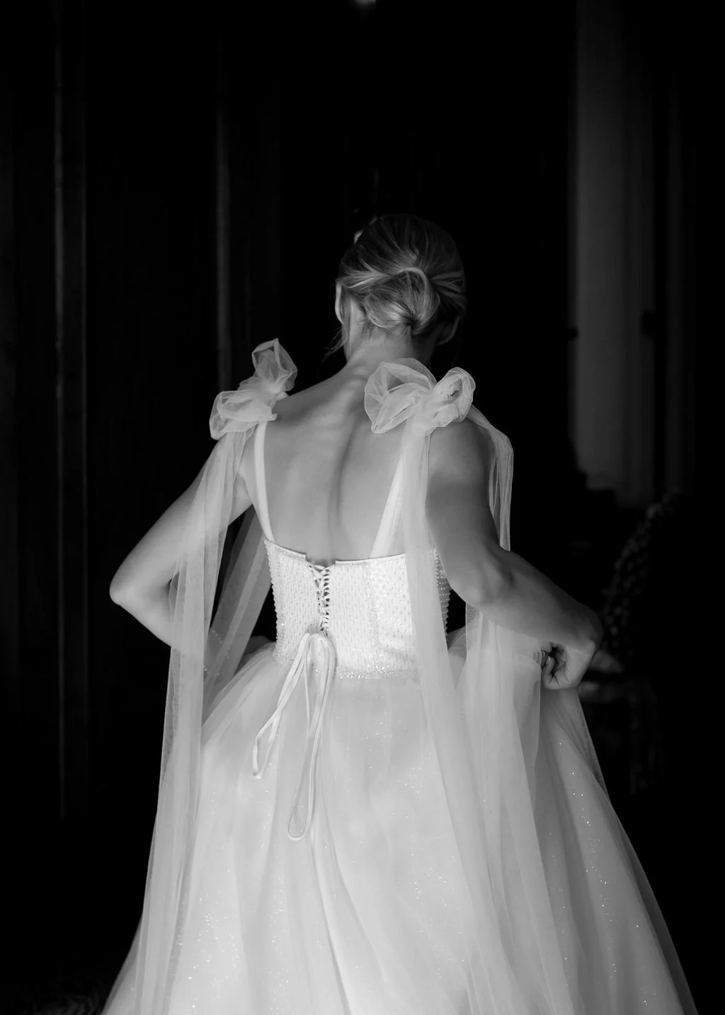 Ti Amo wedding photographer. Floaty romantic wedding dress with bows