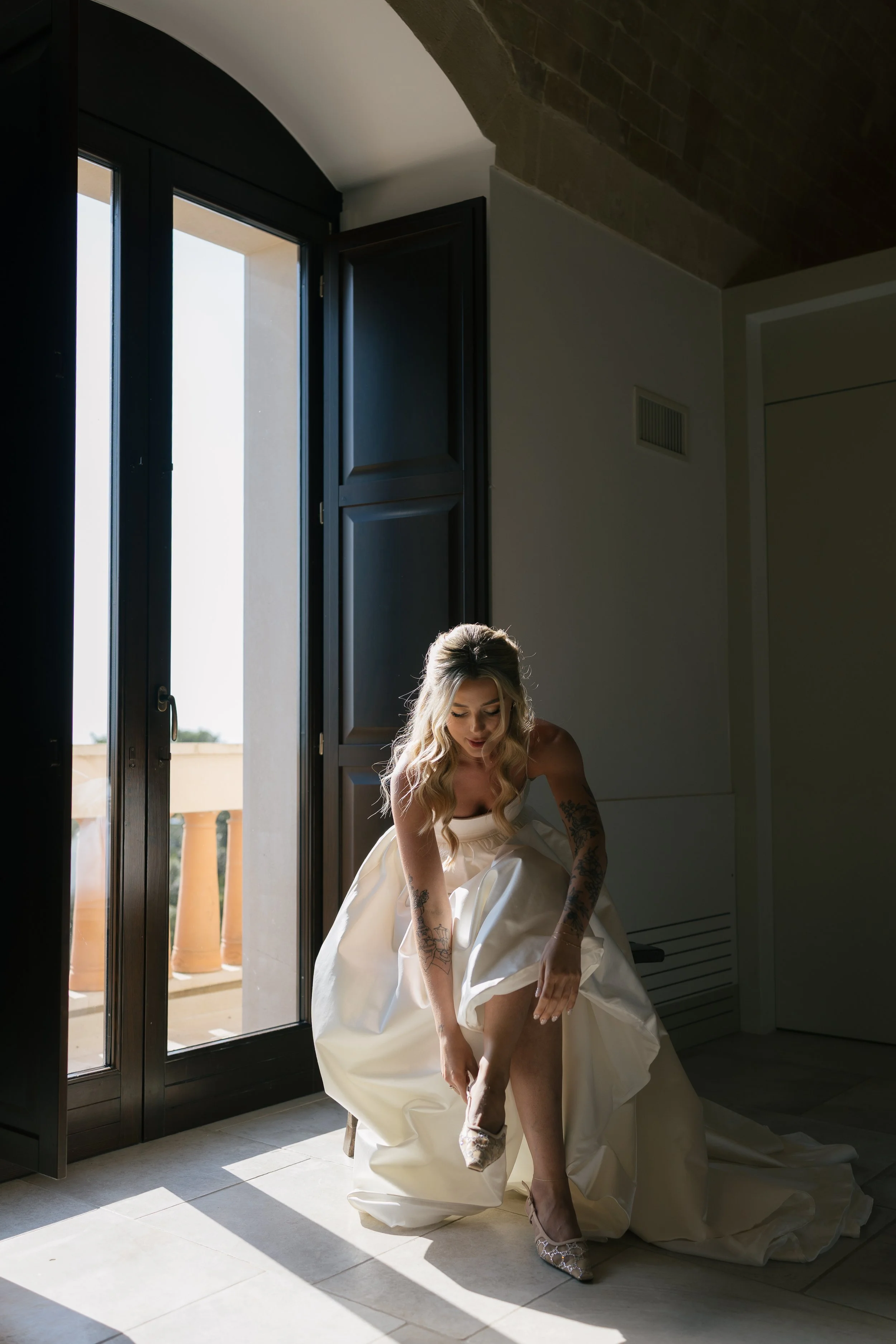 Bridal fashion, wedding dress by The Own Studio, shoes by Gucci