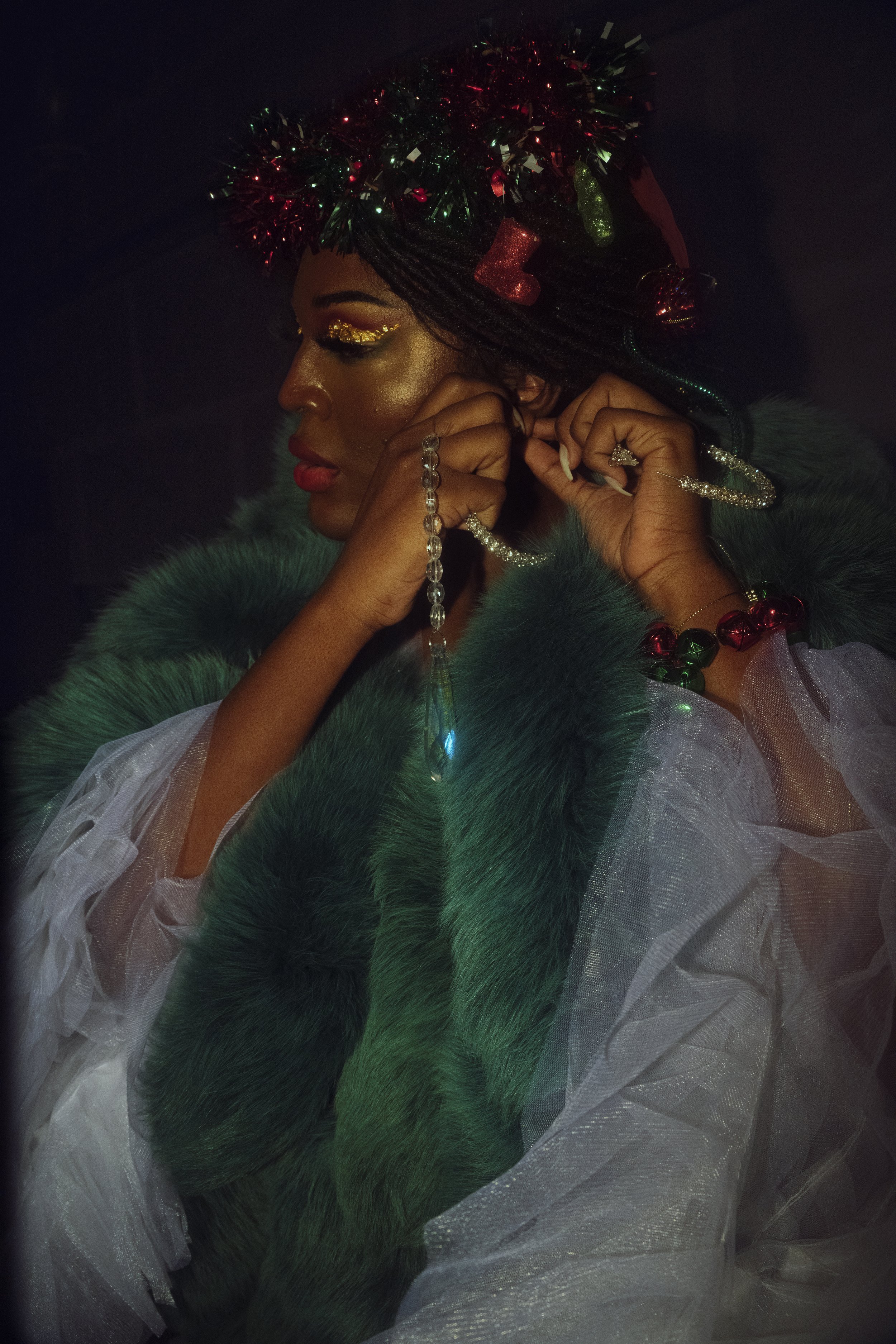Behind the scenes at the Tacoma Urban Performing Arts Center (T.U.P.A.C.) preparing to represent The Monéts during the Christmas Showdown Ball. As expected of my ballroom muse, adorned in a way that evoked opulence, she was a marvel to behold.