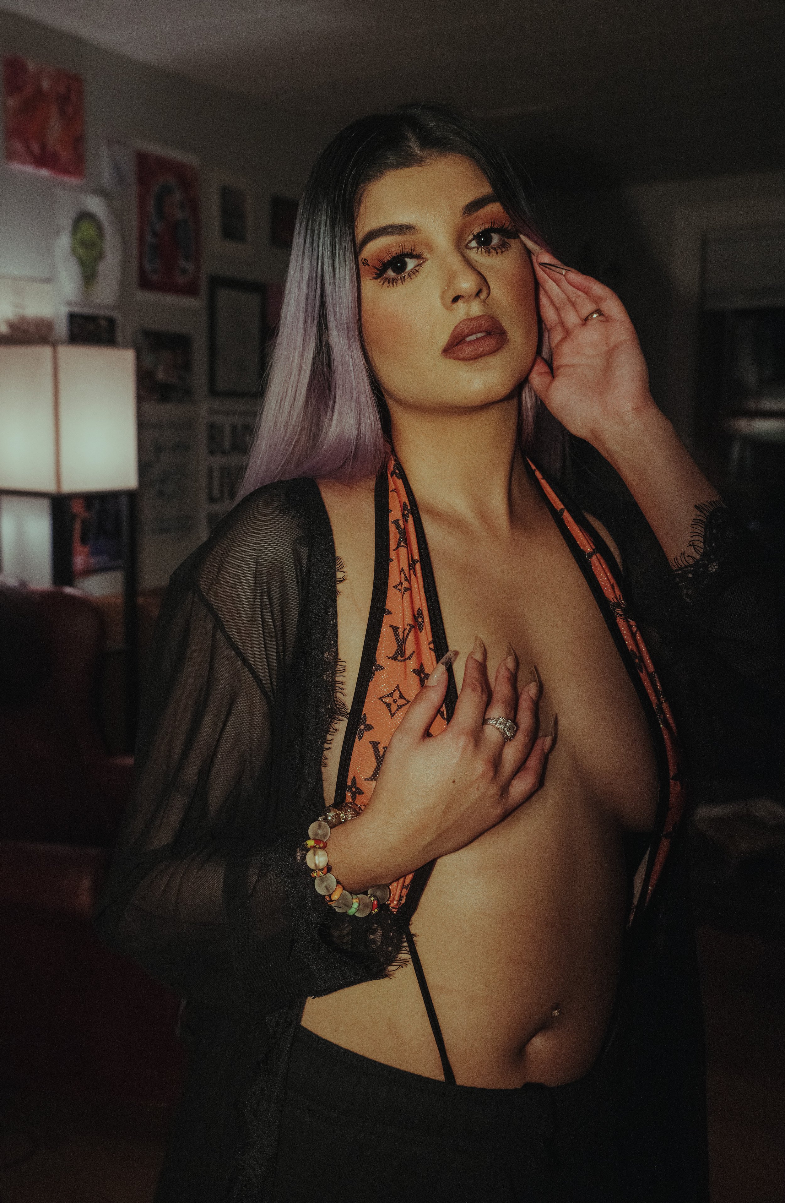 Aries, a passionate nail artist who rarely went anywhere without her service dog, Paco the chihuahua. Her role in the house was sort of like a godmother. House meetings and practice sessions were usually held at her condo. She was one of the first pe
