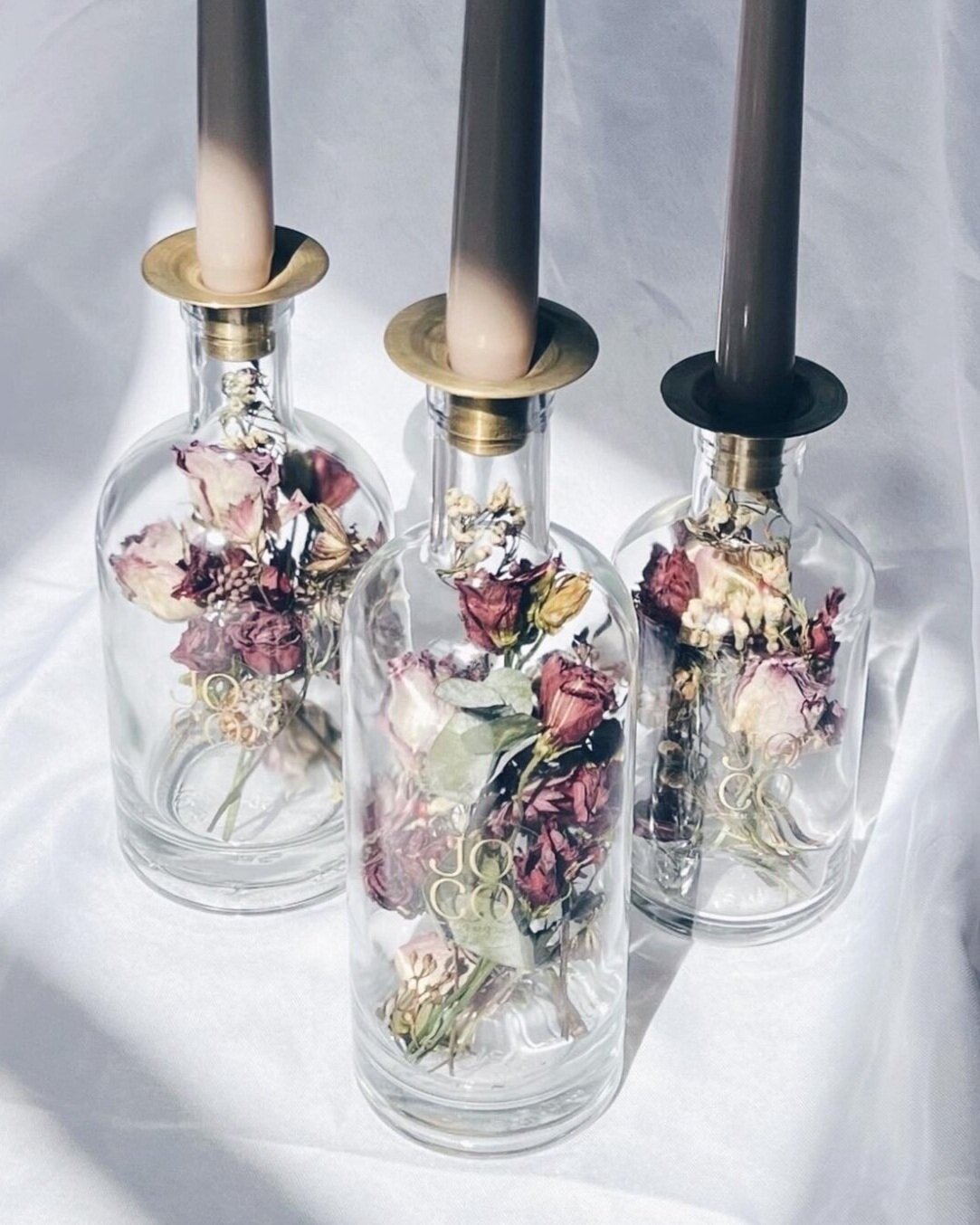 Pressed and dried flower candles perfect for bouquet preservation or gifts.