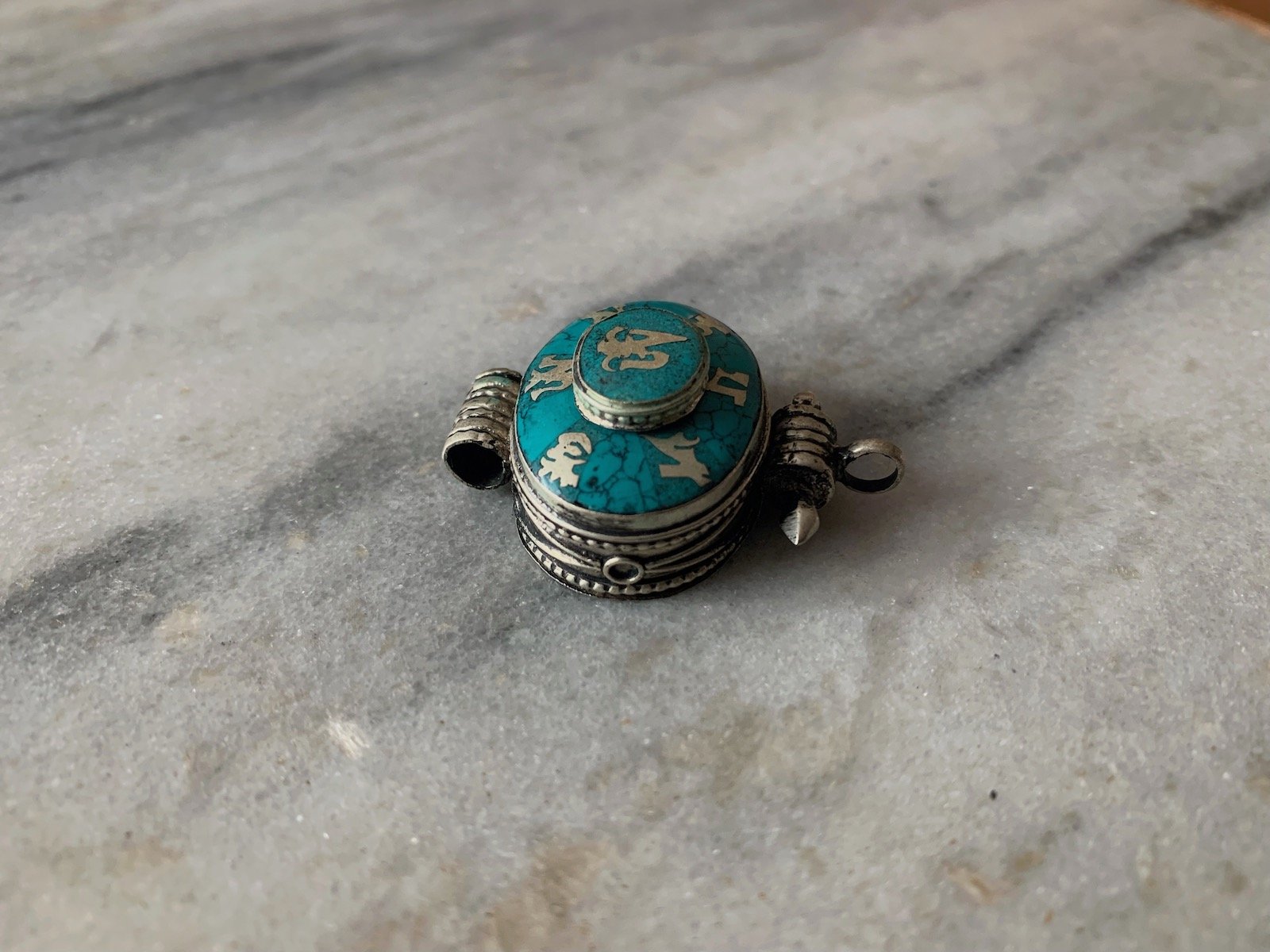 Tibetan Om Turquoise Gau