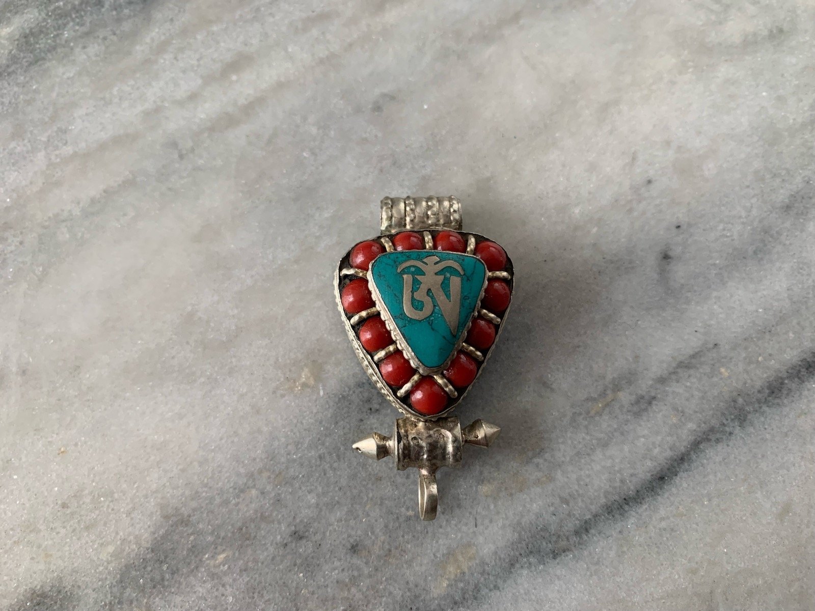Inverted Teardrop Tibetan OM Gau