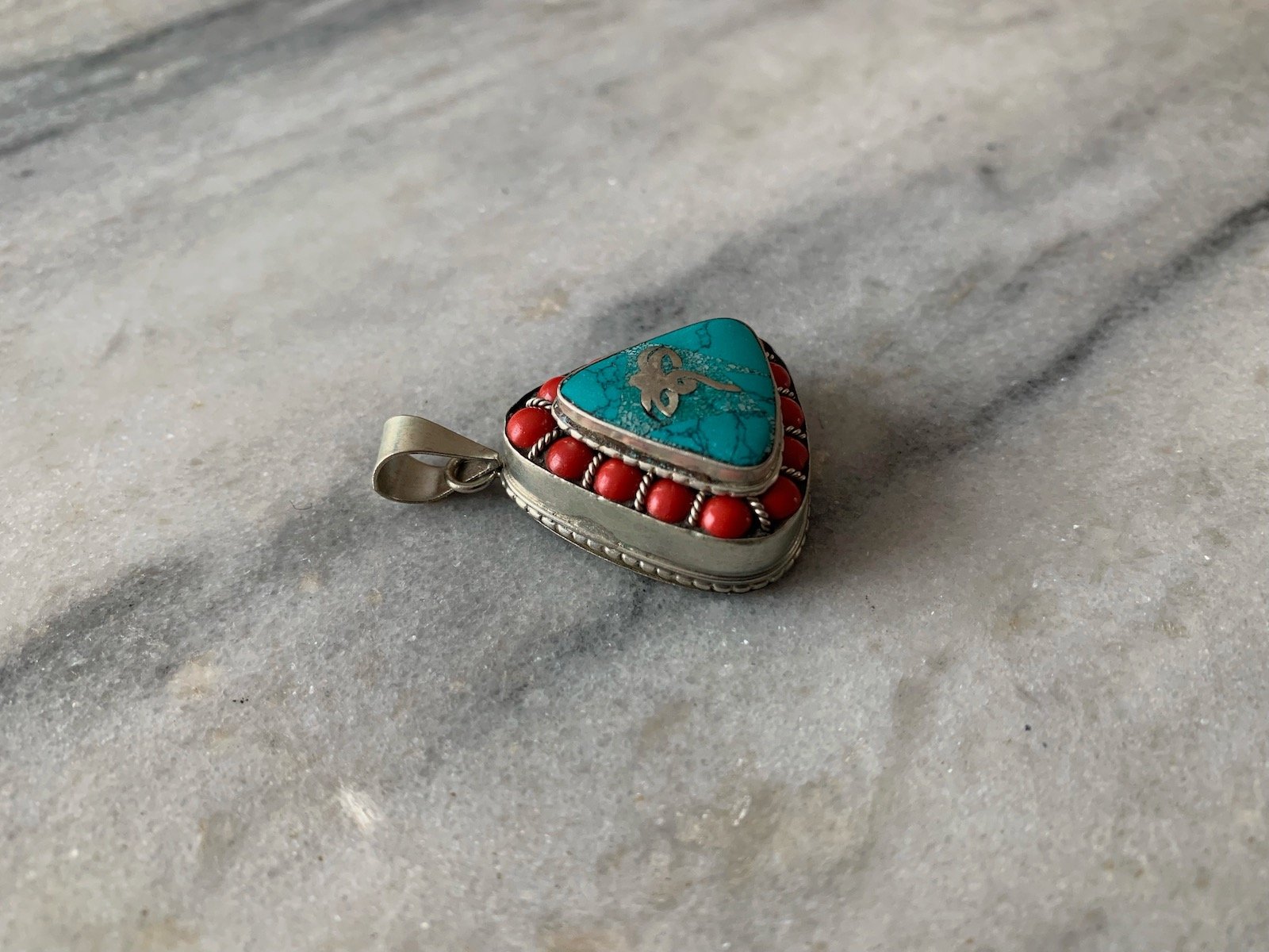 Triangle Seva Coral & Turquoise Gau, side