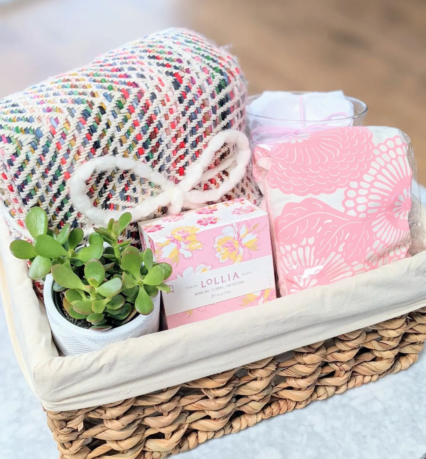 Bow and Bestow specializes in providing curated gifts for life's ups AND downs.

This basket was lovingly assembled for a sweet mama that had just experienced a heartbreaking miscarriage. It included cozy self-care items like a heating pad and a blan