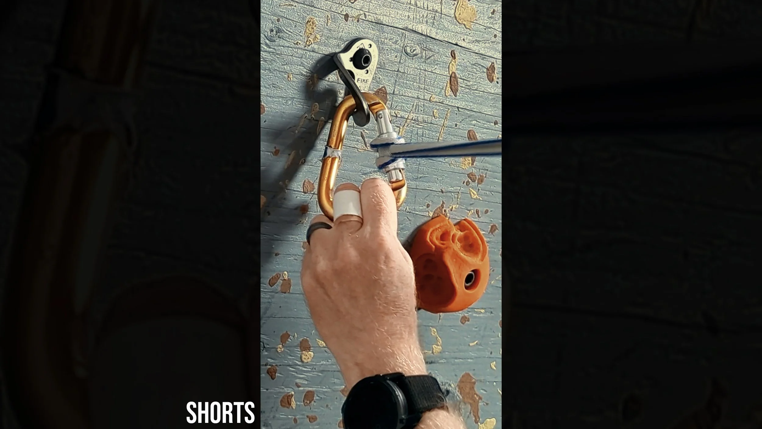 Physics of a Stuck Carabiner Gate
