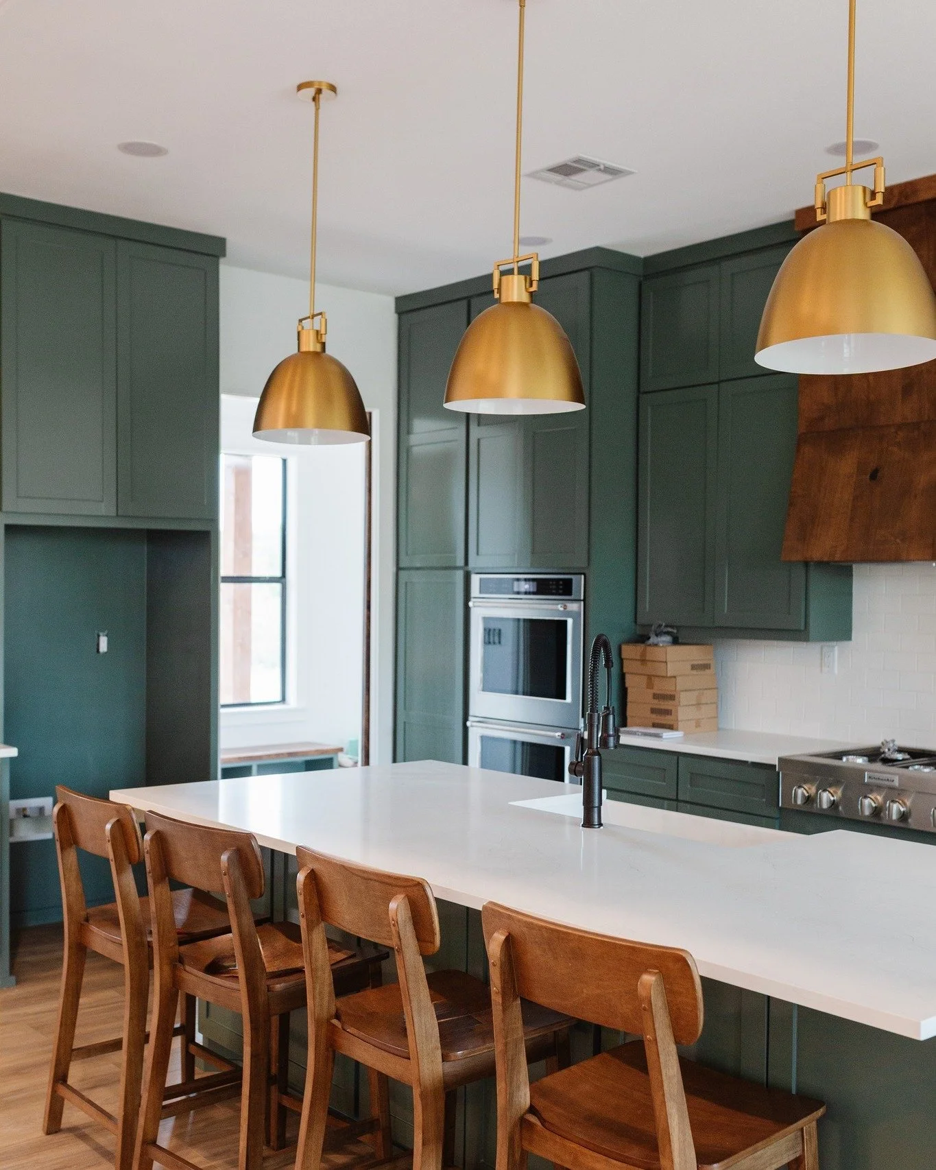 "I do not want a white house." Done. This home is full of color, fun and warmth. 
#kitchendesign #greenkitchen #greencabinets #colorfulkitchen #kitchenideas #funkitchen #bluegreencabinets