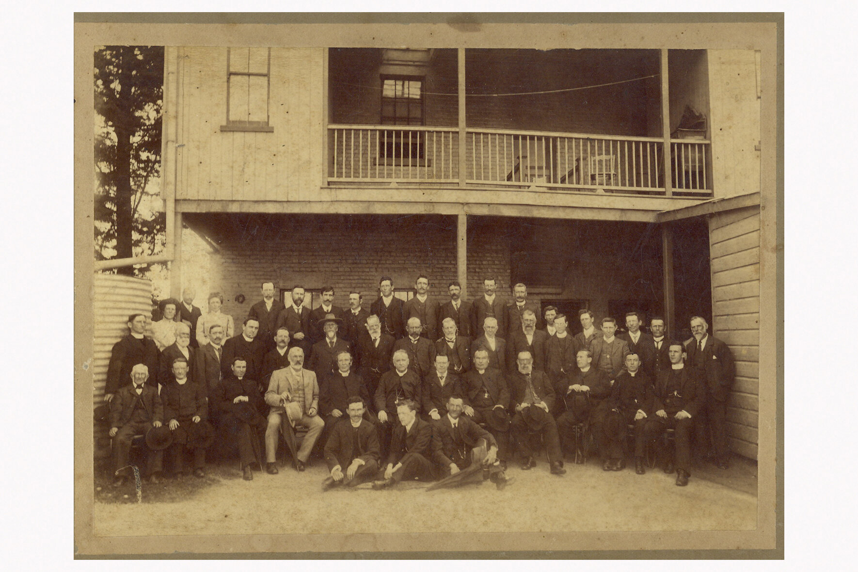 Hibernian Society gathering behind the Royal Hotel, Maitland, c1900 W.D. Power is in the front row in the light coloured suit, and directly behind him to the left is my father’s father Matthew McNamee. We only discovered that they were together in t…