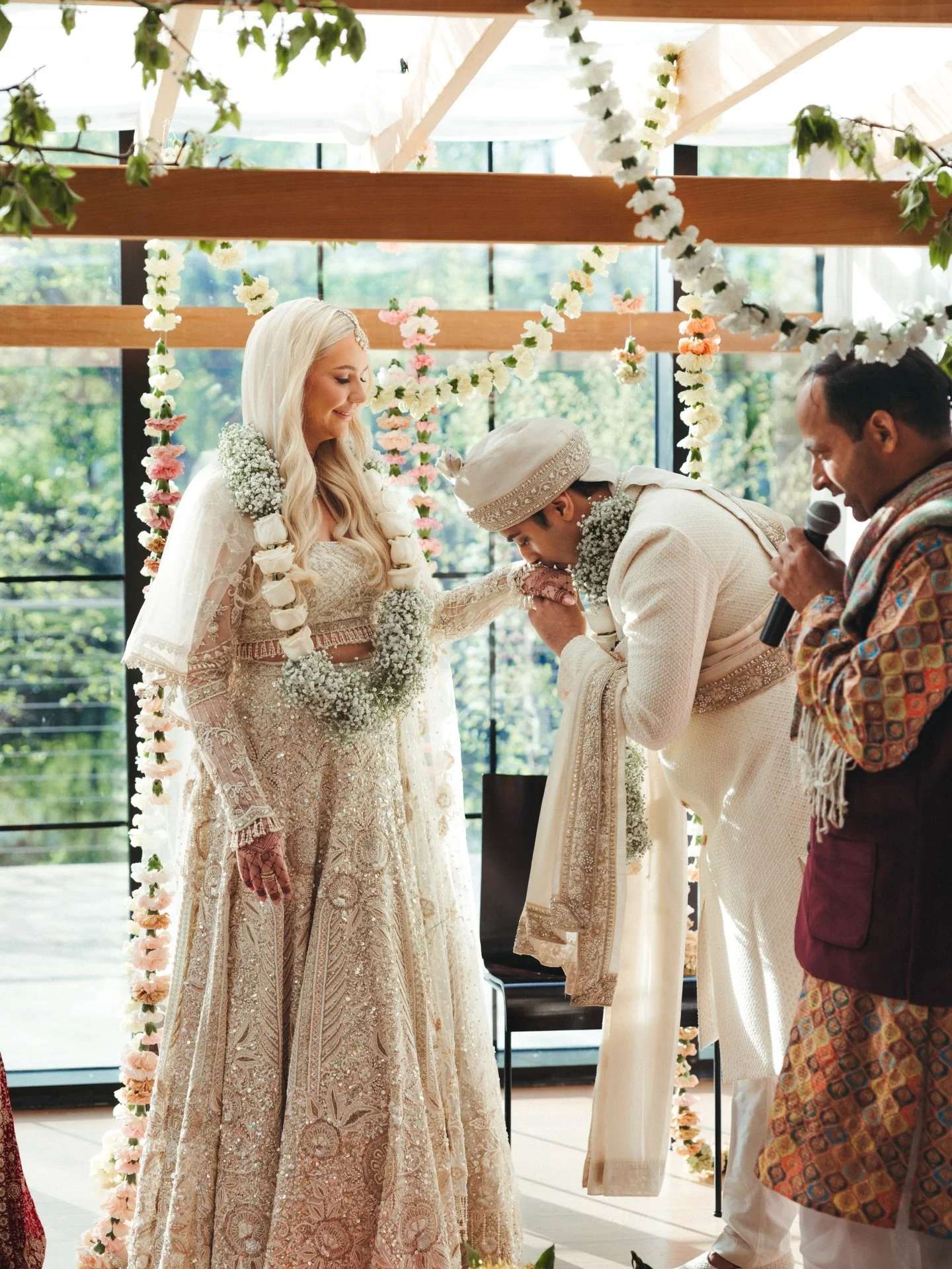 tucked away behind the pipe and drape, I was peeking through the curtains to watch the ceremony. it rained all afternoon, and stopped right before they opened the doors. when heather walked down the aisle, I nearly died. it was like the queen had ent
