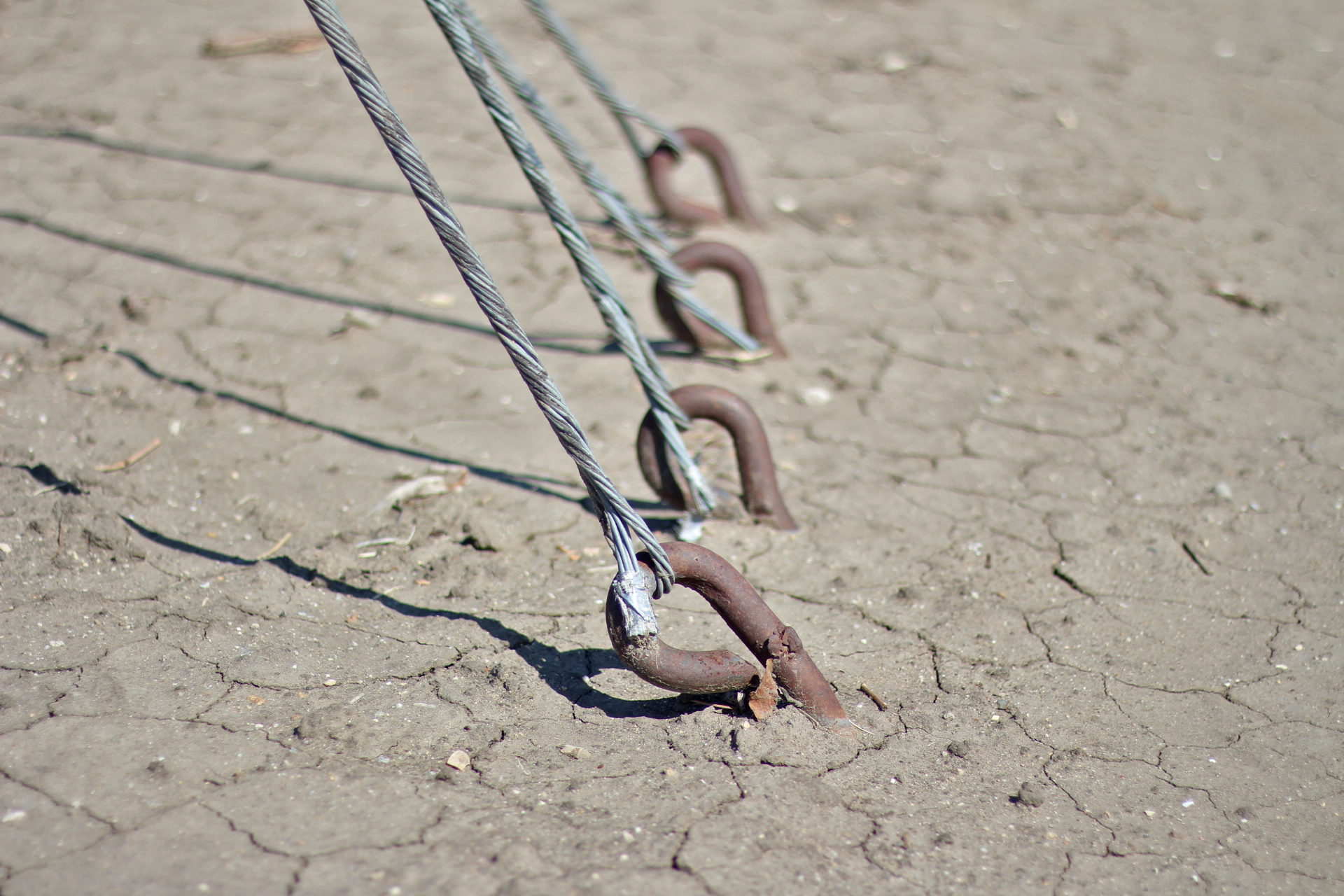 earth anchors attached to wire rope cable