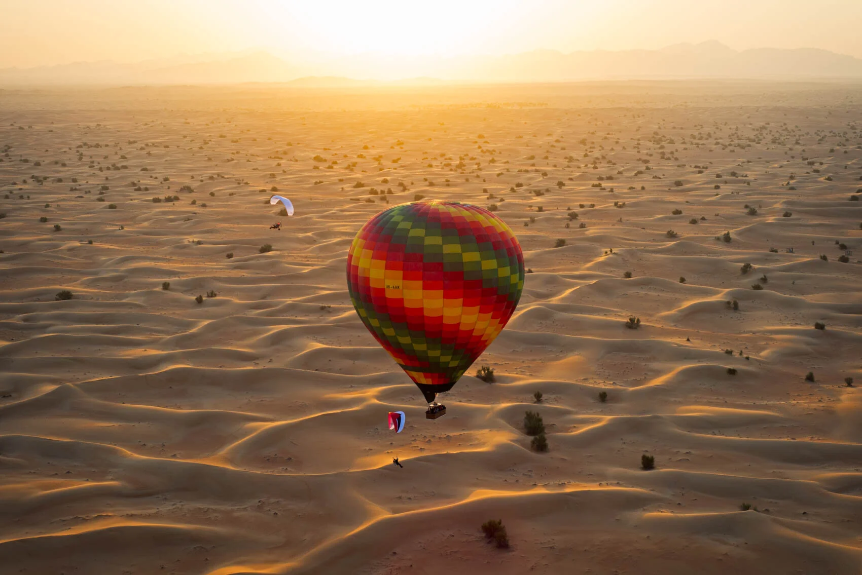 stock-photo-balloons-over-the-desert-246733917.jpg