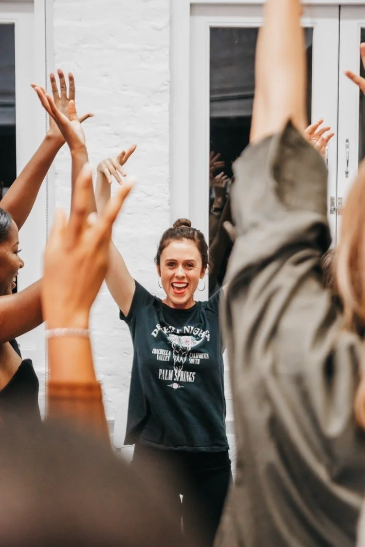 woman teaching a movement class in the UK