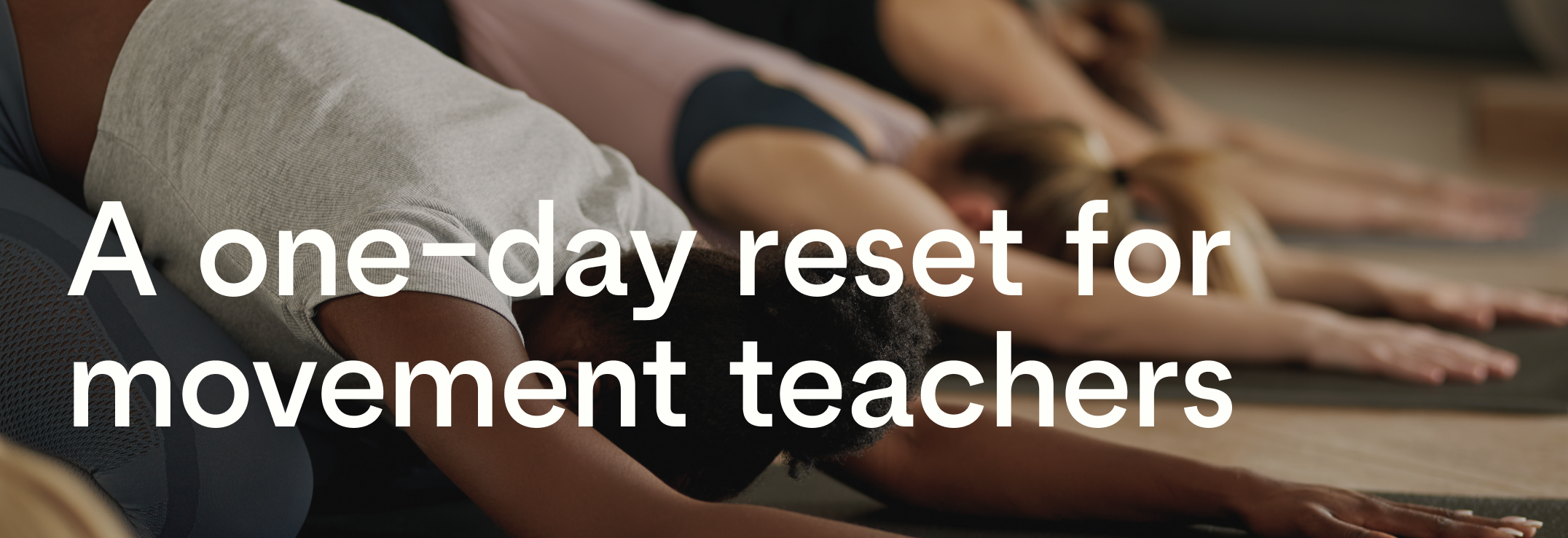 pilates teachers retreat, the pilates teachers are stretching on a mat and relaxing. They are reseting so they can teach better.