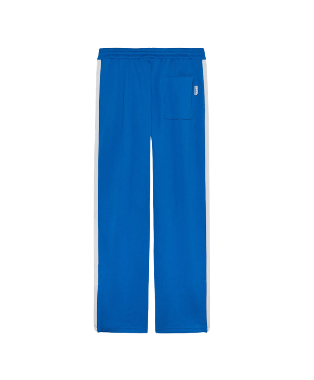 HOPEIUM track pants in cobalt with side stripes, elastic waistband, and relaxed fit.