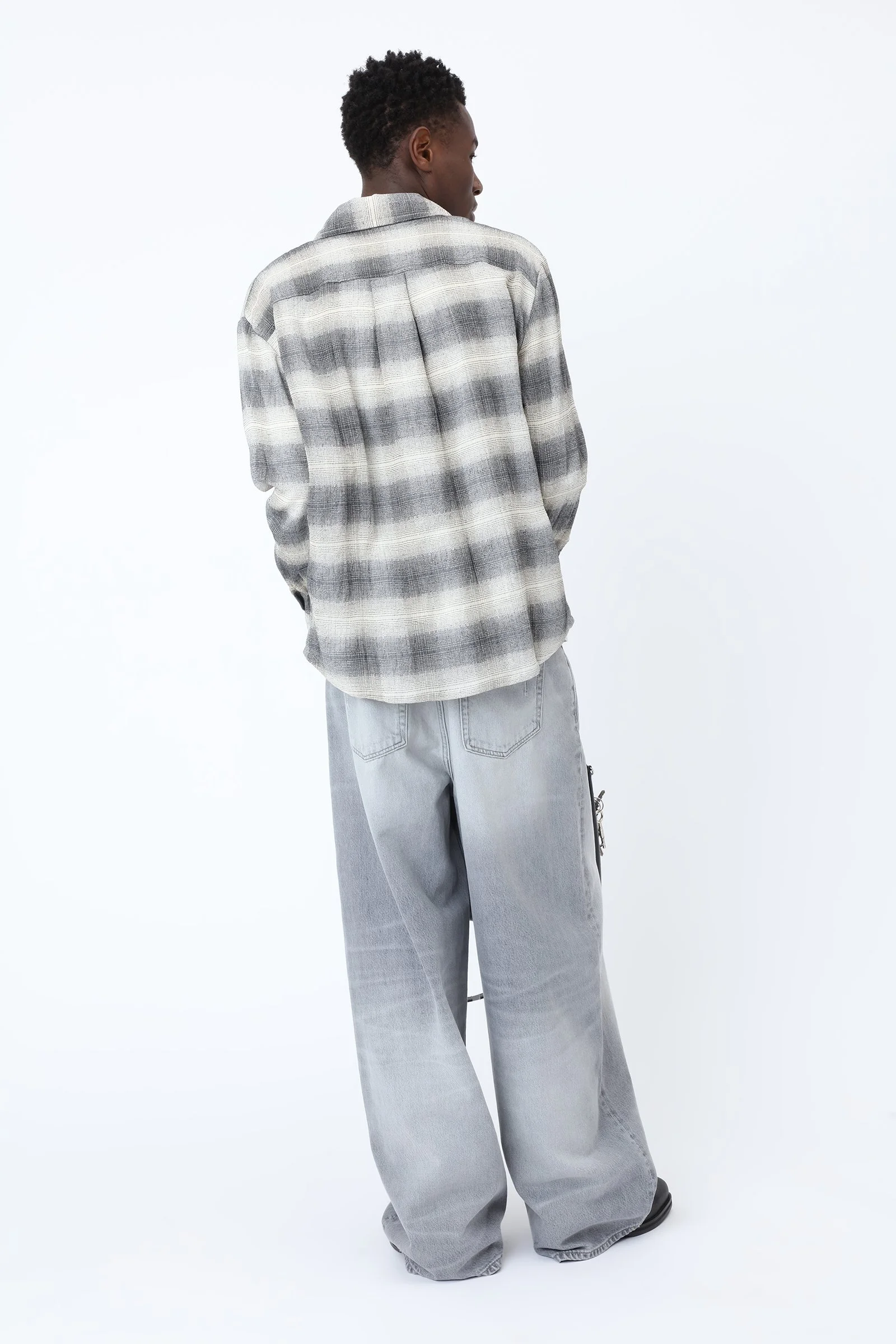 Won Hundred LYON Jeans for men in Bright Black, crafted from organic cotton denim with an oversized fit, wide straight legs and a washed finish.