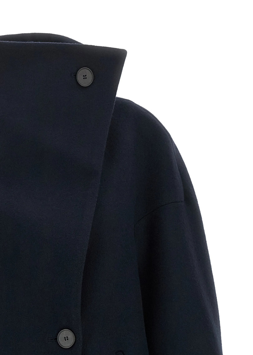 TELA SCOTT Coat in Blue, made in Italy with an oversized cocoon silhouette, asymmetric stand collar, dropped shoulders and button closure.