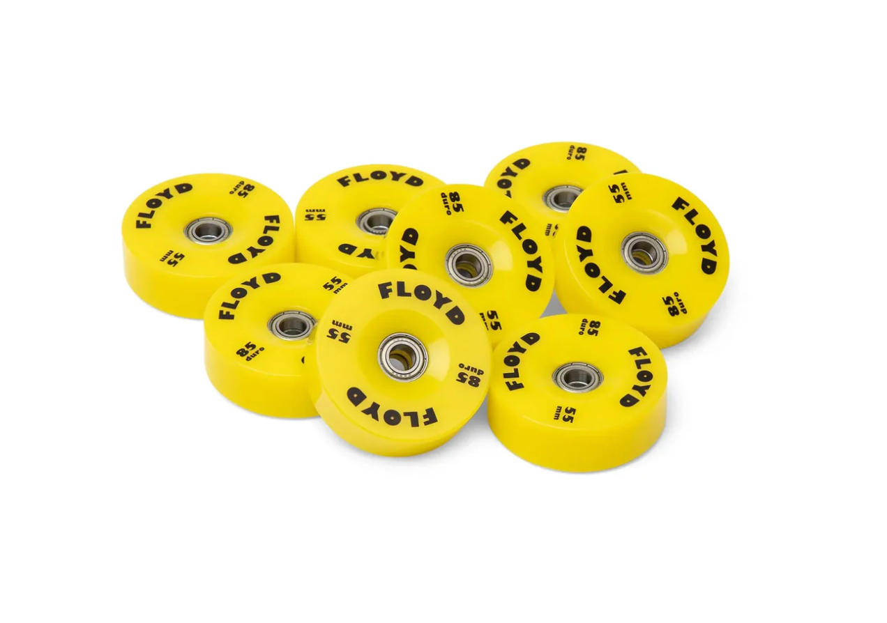 FLOYD wheel set in Monster Yellow with 8 polyurethane skateboard wheels and ABEC-7 bearings for smooth travel.