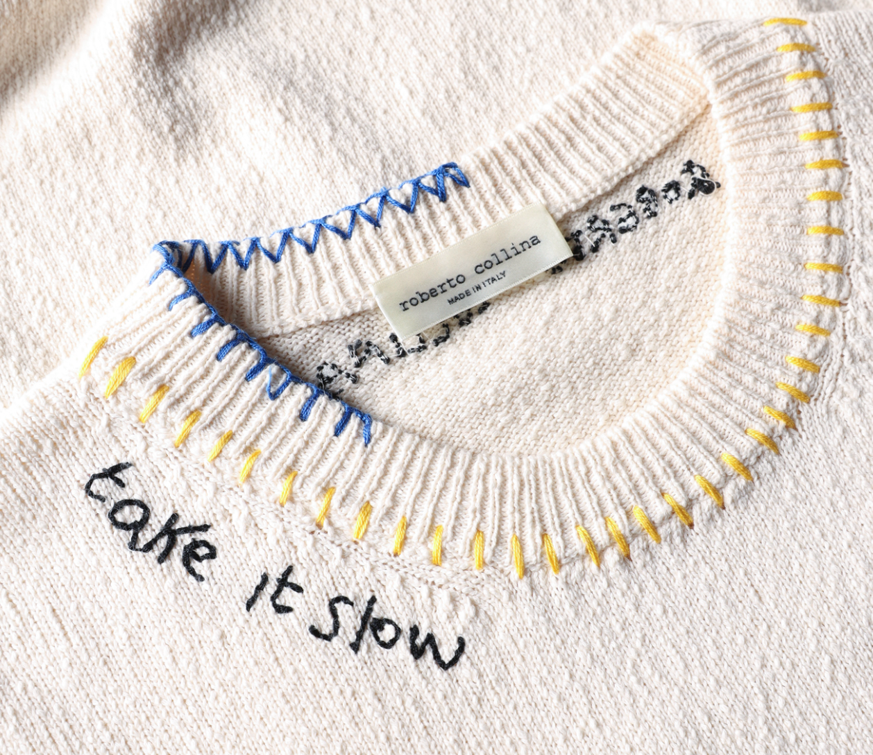 Roberto Collina “CIAO AMORE” sweater in natural with textured cotton knit, embroidered lettering, and relaxed fit.