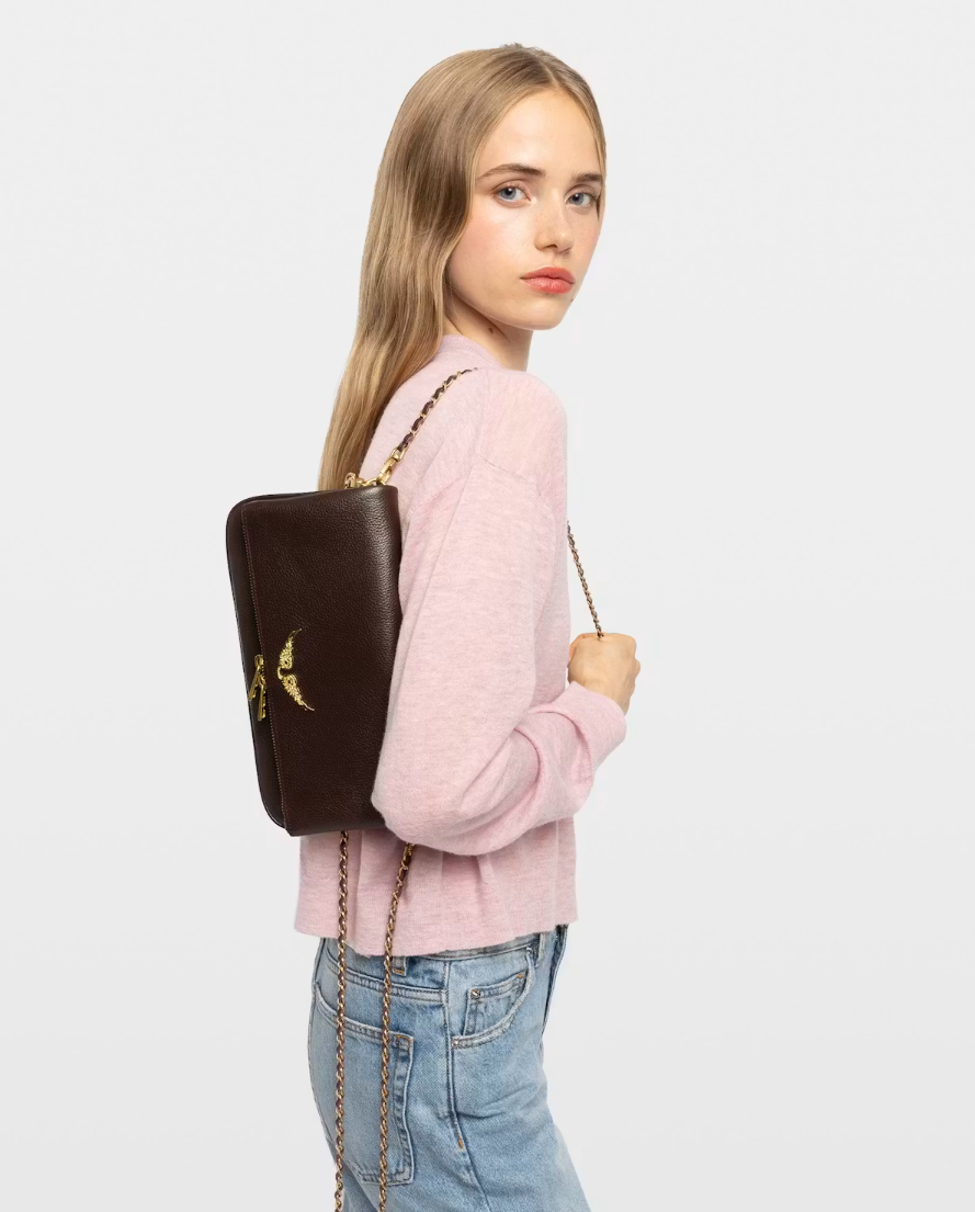 Zadig&Voltaire Rock clutch in Brownie grained leather with crystal wings and removable chain straps.