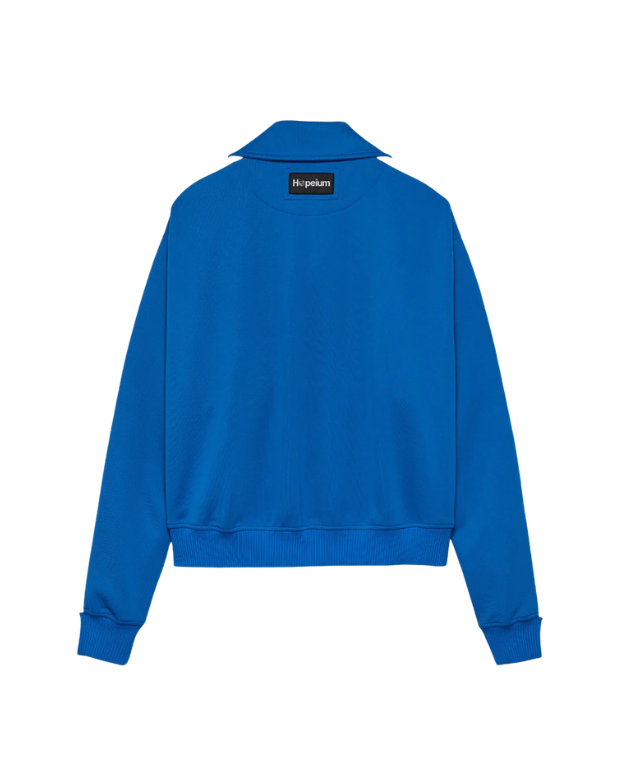HOPEIUM track jacket in cobalt with cropped oversized fit, stripe sleeves, and logo details.