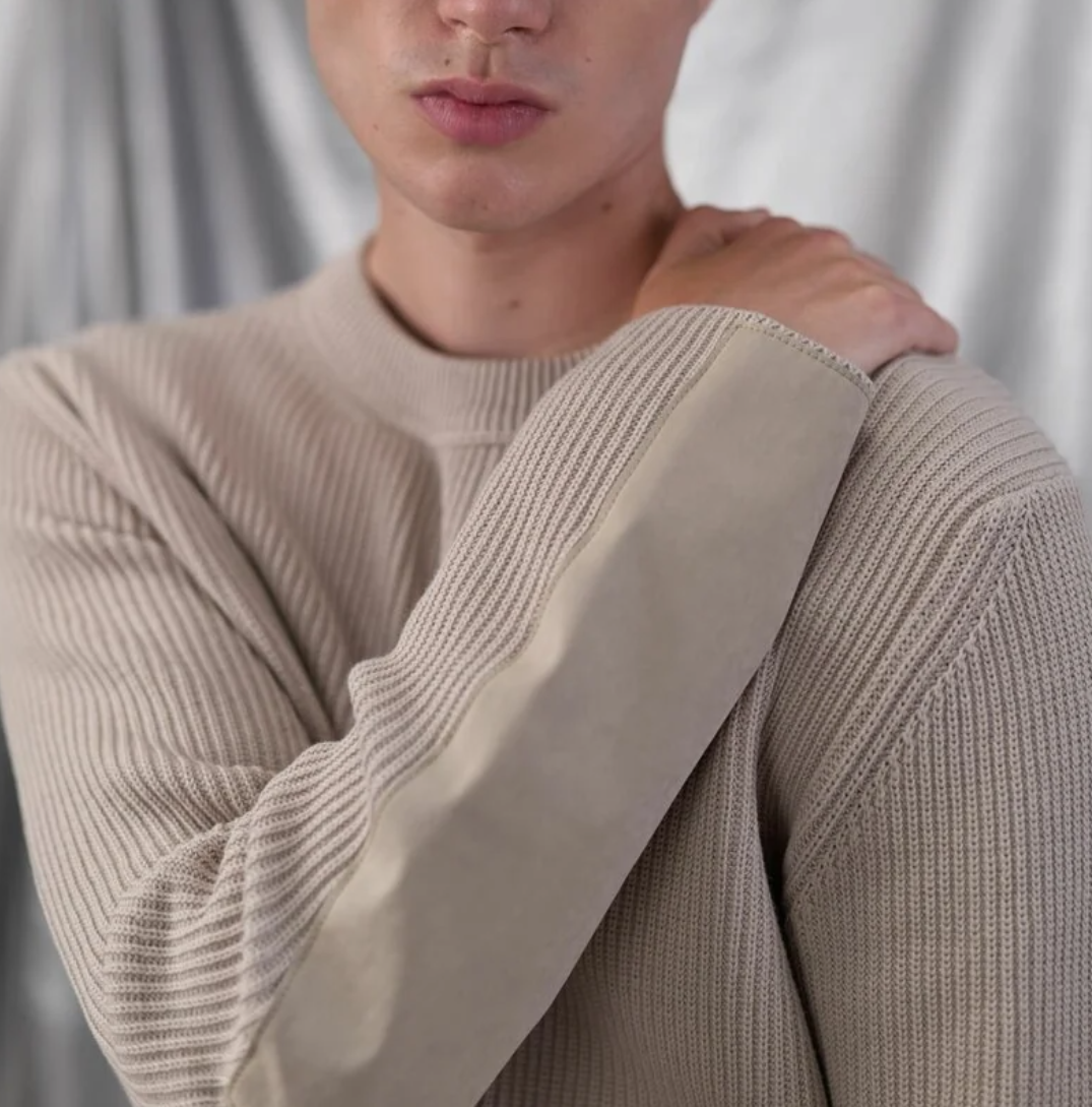 Ten C cotton knit sweater in pale taupe with ribbed texture and OJJ fabric sleeve details.