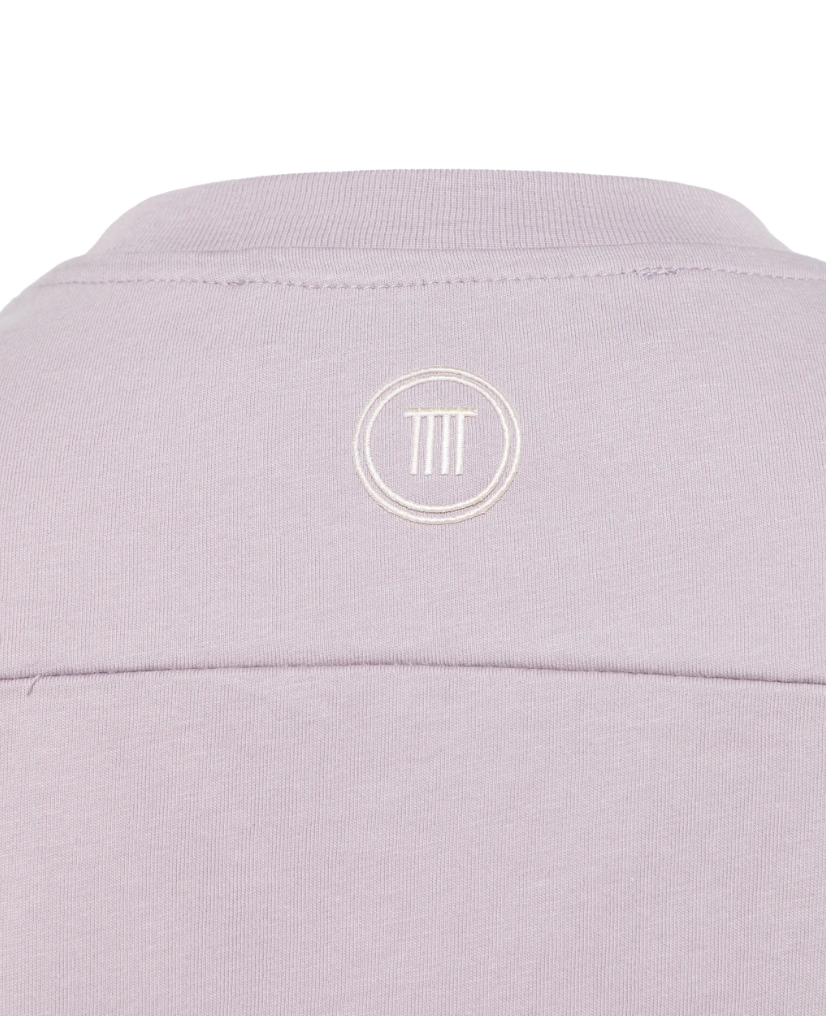 Tela light lilac T-shirt with tie waist, sleeveless design, and logo embroidery.