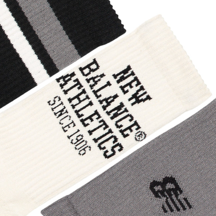 New Balance striped socks set unisex in black with logo print, ribbed knit, and pack of three.