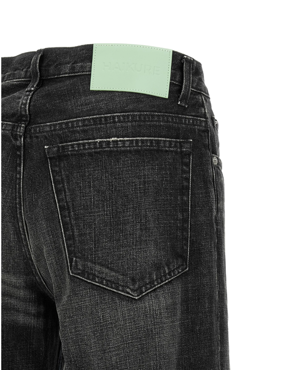 Haikure CLAIRE Jeans for women in Hedwig Black with a flared leg, faded finish, whiskering and classic five-pocket design. Made in Italy.