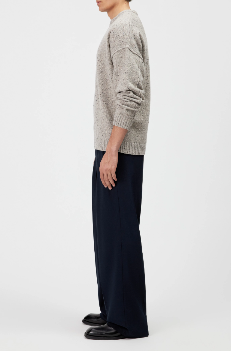 Drykorn NEELIO Knit Sweater for men in Beige with a relaxed fit and distinctive speckled tweed texture.