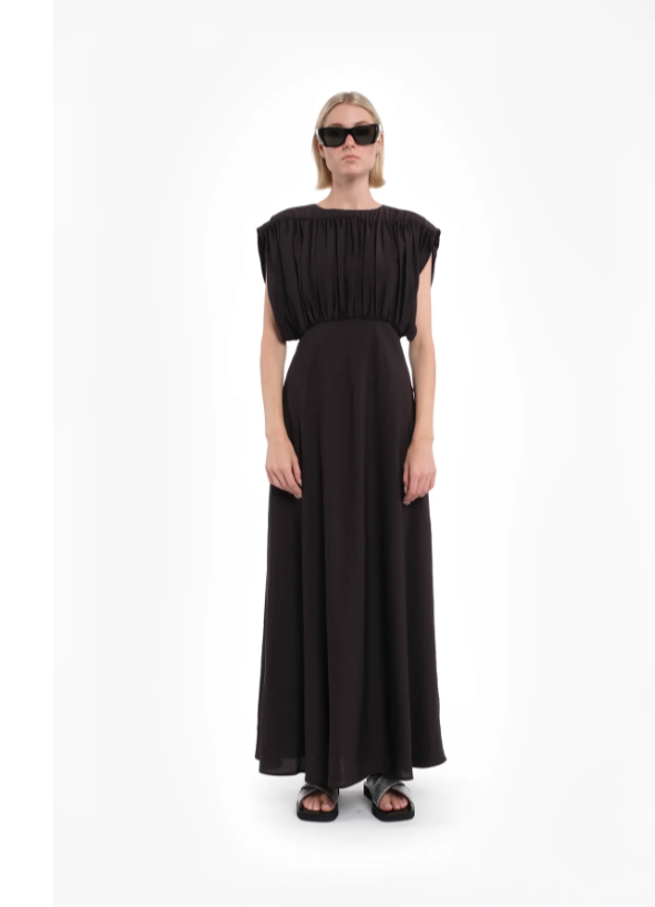 Tela D. Vega maxi dress in coffee brown Tencel with ruched top and sleeveless design.