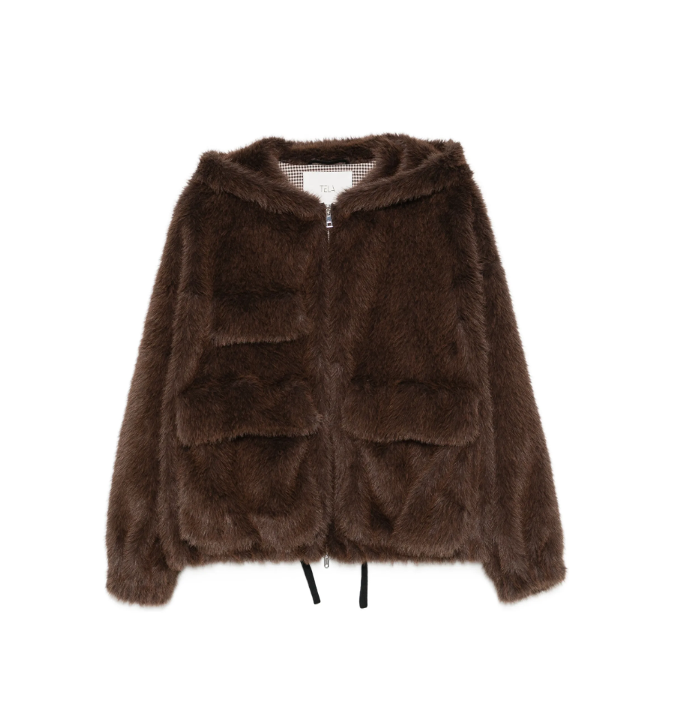 TELA Teddy Fur Jacket in Brown, featuring a plush teddy texture, hood, front zip closure, oversized side pockets and front patch pocket.