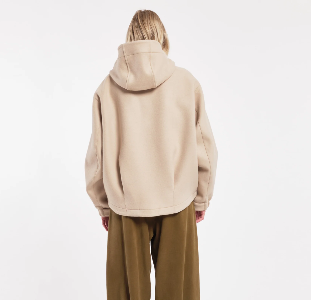 TELA Oversized Hooded Jacket in Beige, made in Italy from a virgin wool blend with flap pockets, zip-and-snap closure and adjustable hem.