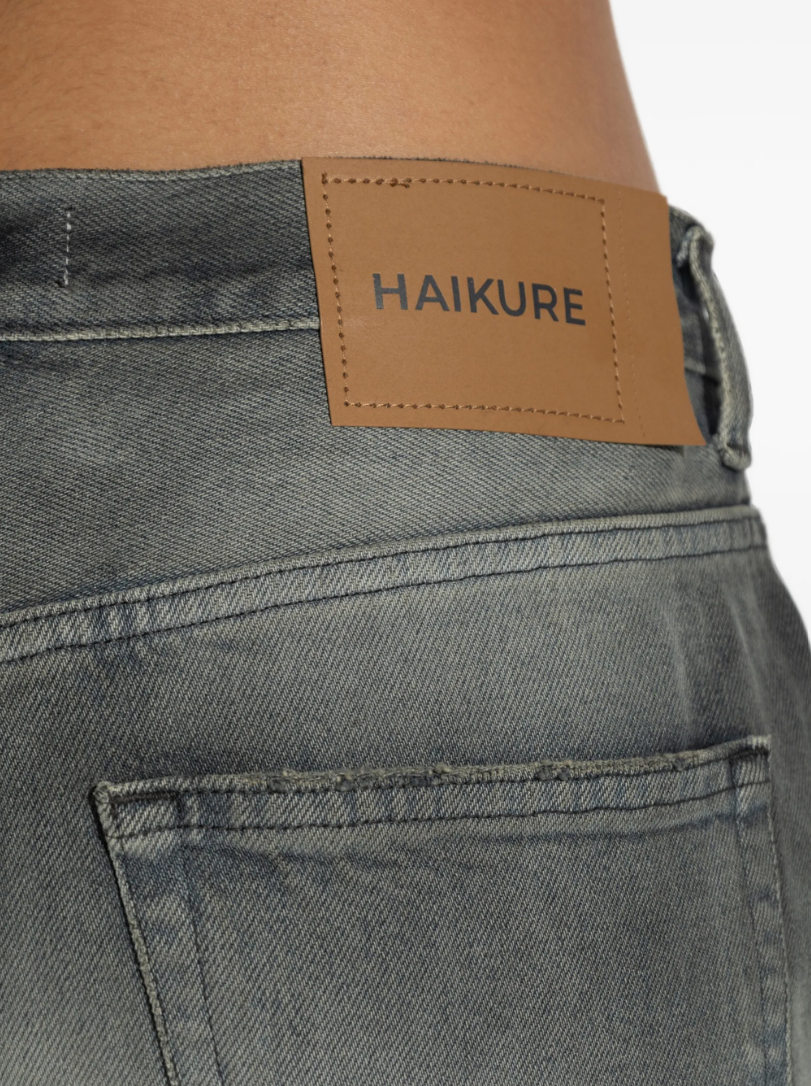 HAIKURE WINNY Smoke Jeans in Smoke Black featuring faded cotton denim, classic five-pocket styling and a signature logo patch.