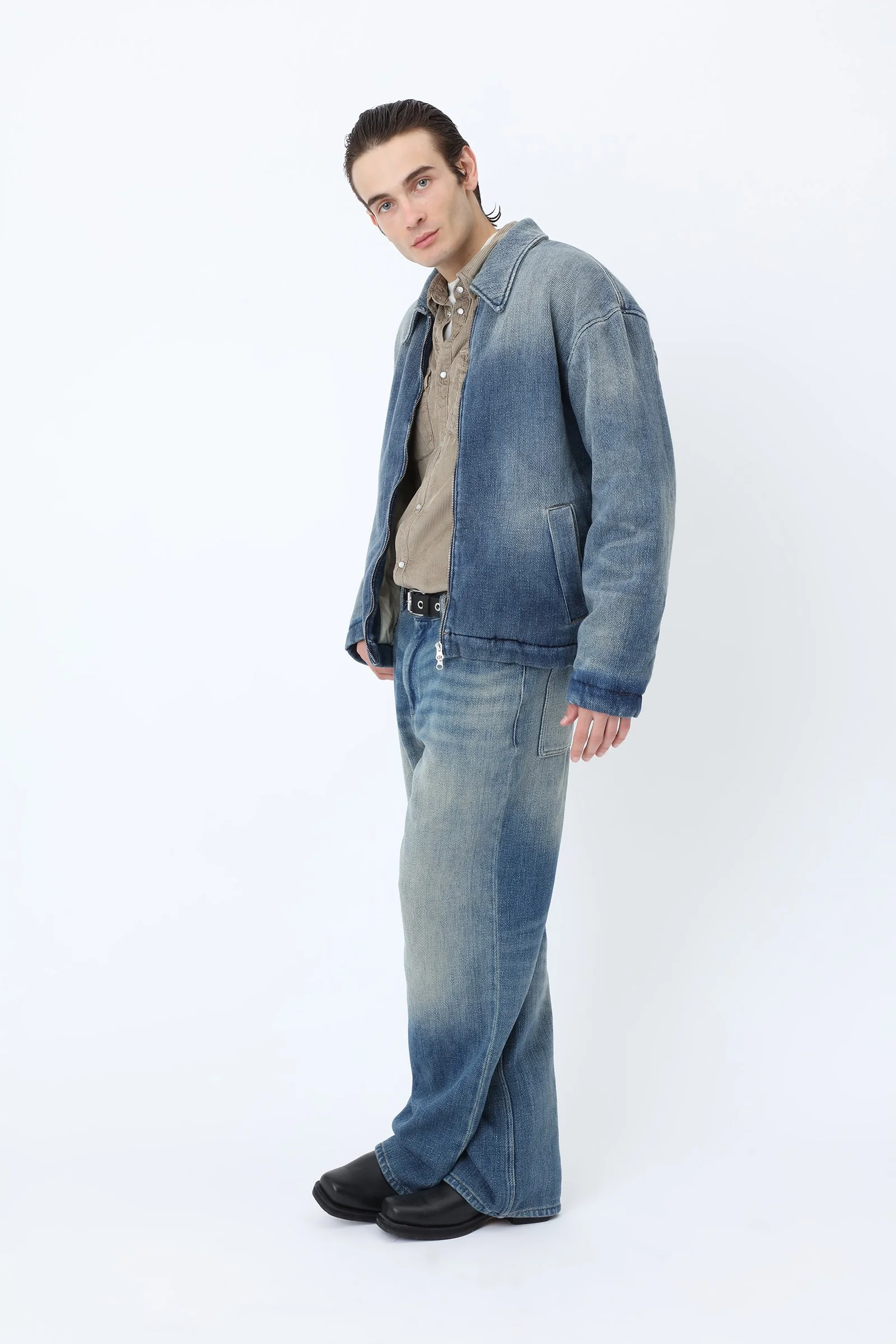 Won Hundred CASE Denim Pants for men in Sticky Blue, crafted from 100% cotton with heavy denim, a fluid drape and vintage-inspired faded details.