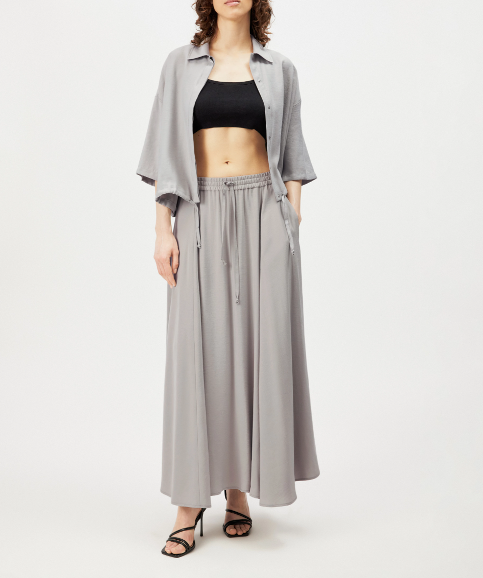 Drykorn QERIME skirt in drizzle with A-line silhouette, mid waist, and flowing twill fabric.