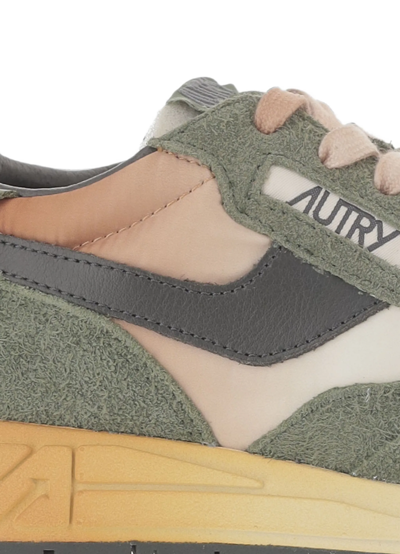 Autry Reelwind sneakers for men in green with suede overlays, logo patch, and retro-inspired design.
