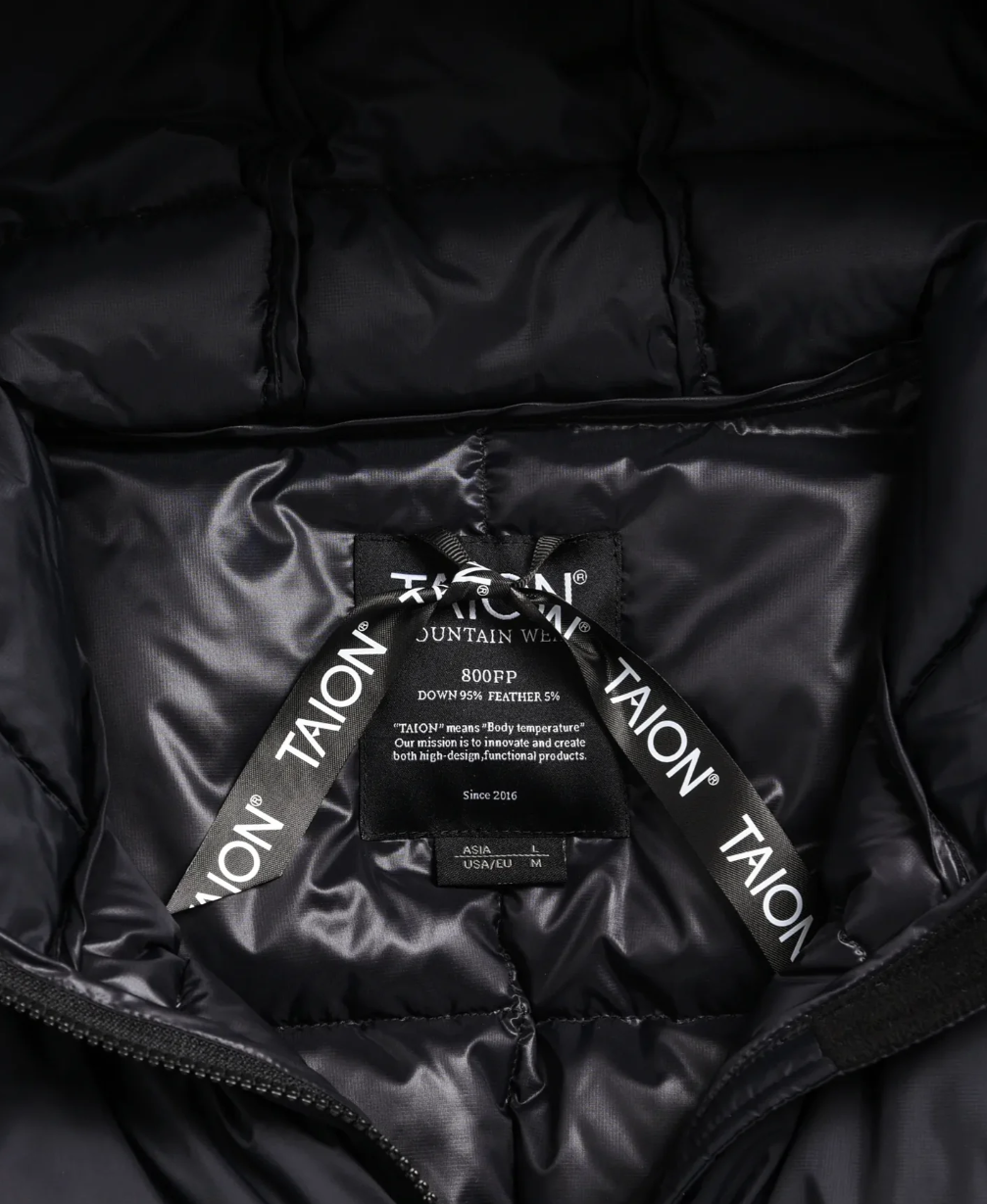 TAION Unisex Mountain Packable Volume Down Hood Coat in black with 800FP down and included storage bag.