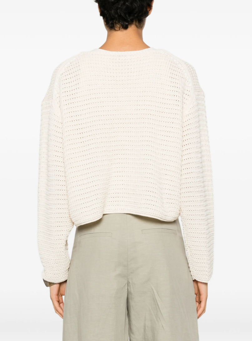 Drykorn IMENIA_2 cropped sweater in natural white with oversized fit, boat neckline, and chunky cotton knit.