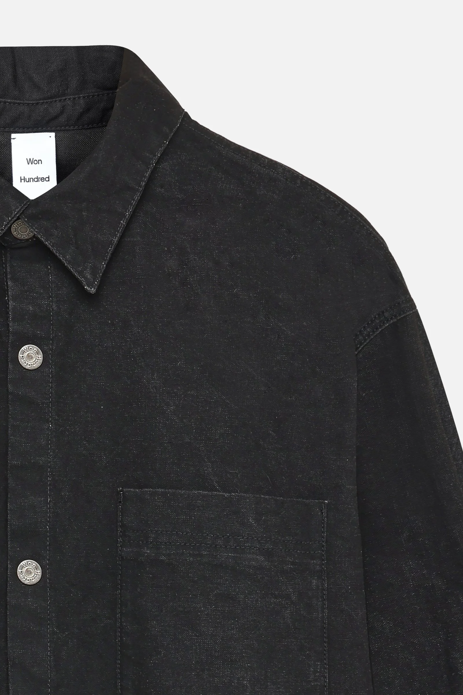 Won Hundred MAZA Denim Shirt for men in Xenon Black, featuring a regular fit, washed denim finish, pointed collar and chest pocket.