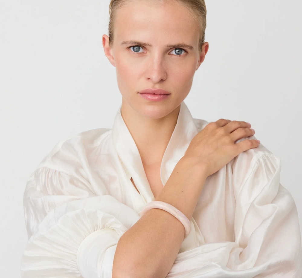 Vanessa Baroni Soft Edge Bangle in Ivory Rose Marble with a sculptural acetate design and elegant marbled finish. Made in Italy.