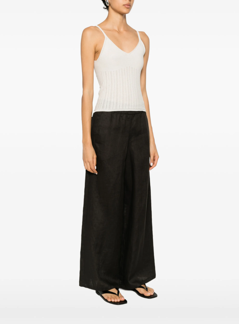 Drykorn FRANCYANE_2 knit top in coconut milk with spaghetti straps, V-neck, and slim fit in 100% cotton.