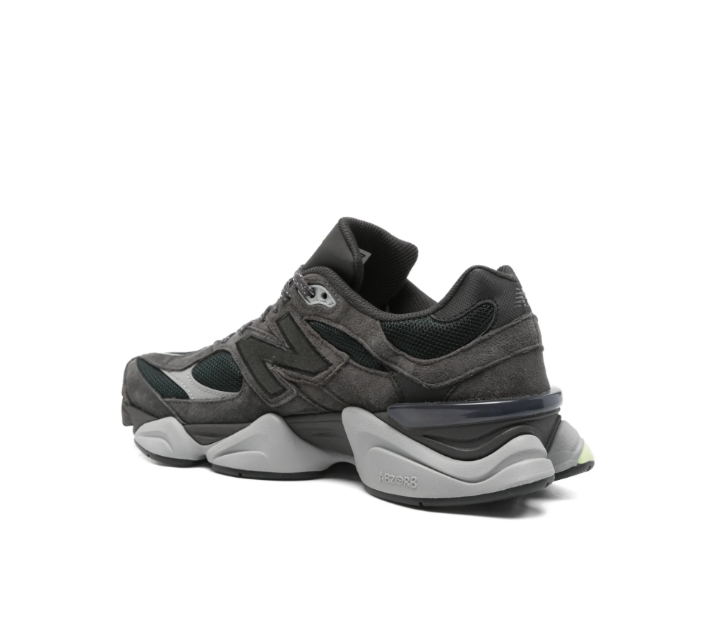 New Balance 9060 sneakers for men in Black Cement Dry Lime with mesh and suede upper and chunky sole.