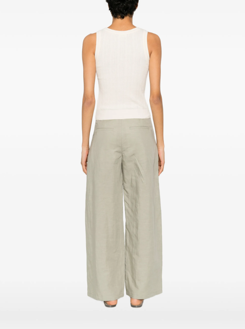 Drykorn SULENA ribbed top in off white with scoop neck, sleeveless design, and slim fit in 100% cotton.