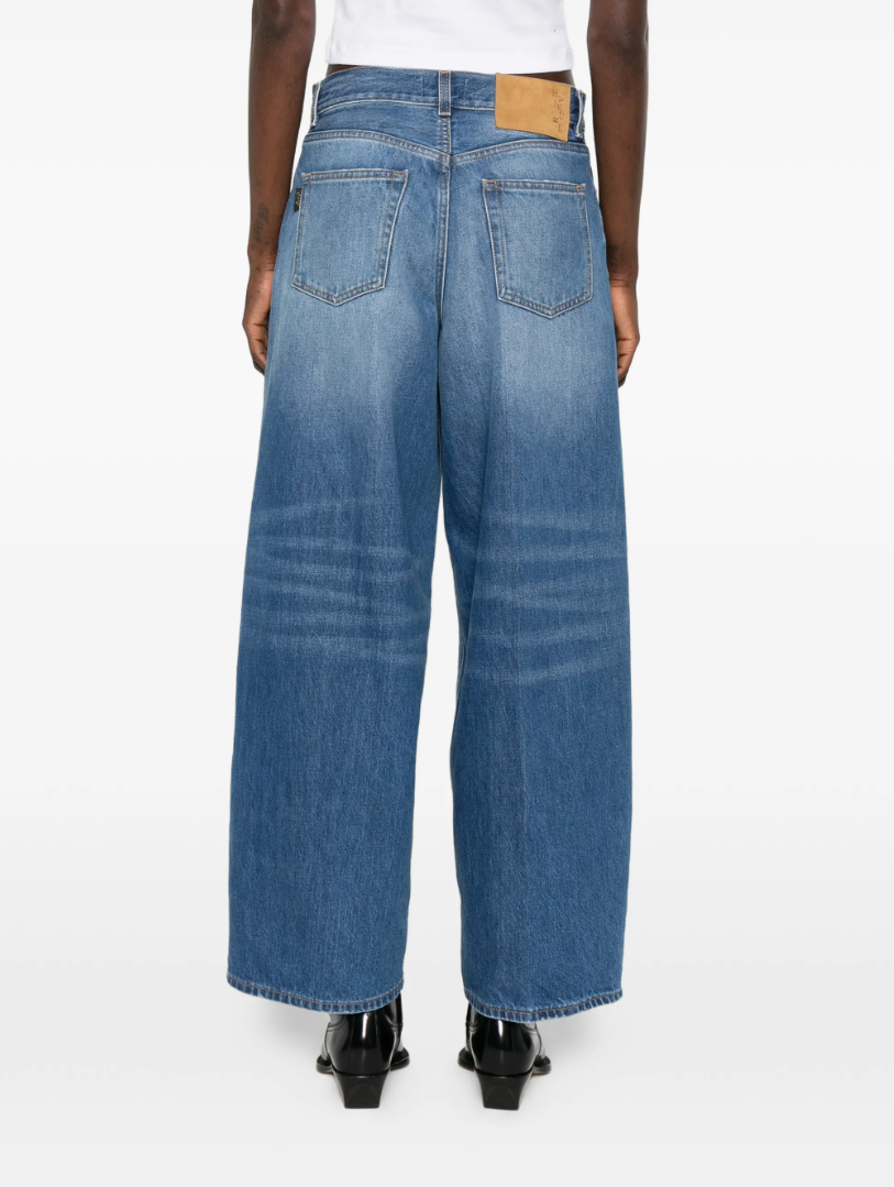 Haikure Bethany jeans in blue with wide leg, button fastening, and five-pocket design.